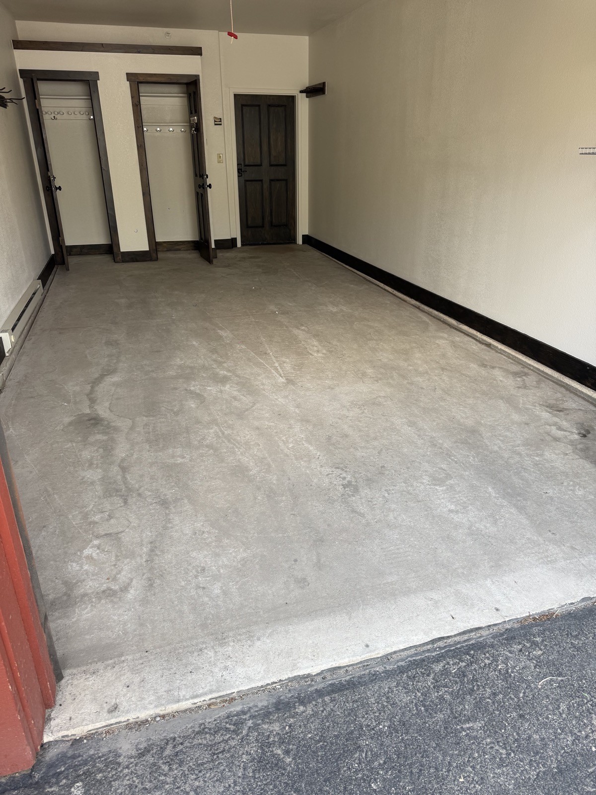 Before — bare concrete garage floor in Keystone CO